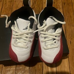 Red and white Jordan 12 worn few times comes in box good condition